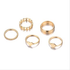 Golden heart rings set